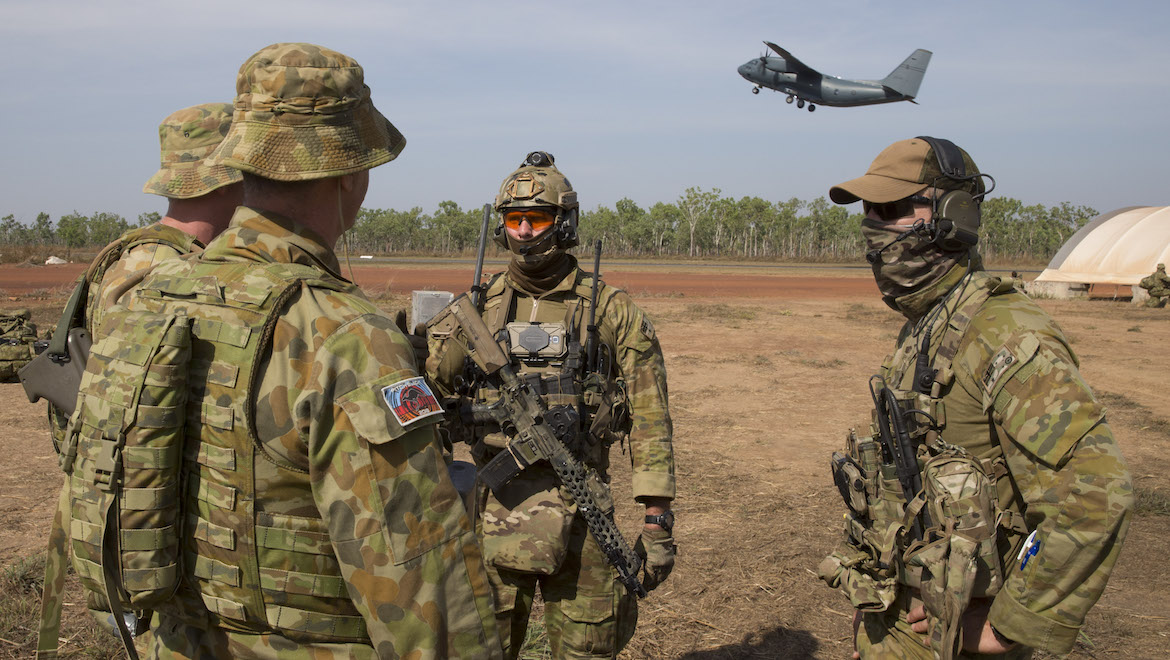 A RAAF Combat Control Team hands over ‘control’ of Batchelor airfield to 382 Squadron and Security Forces during Pitch Black. (Defence)