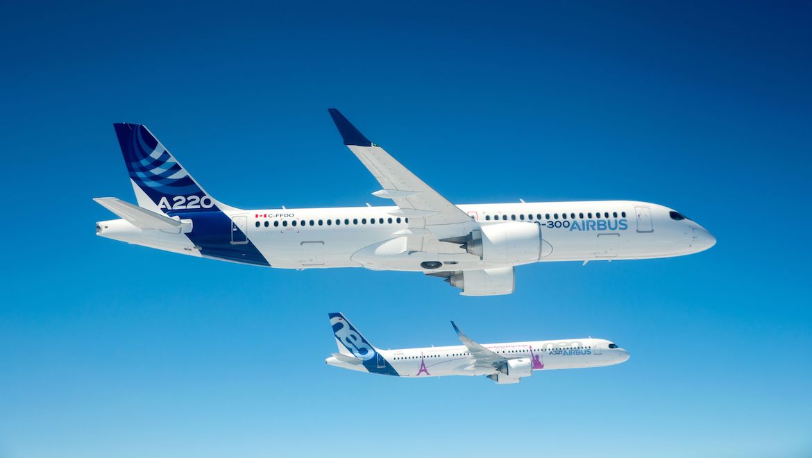 The A220-300 flies in formation with an A321neo during a pre-Farnborough Airshow photo shoot. (Airbus)
