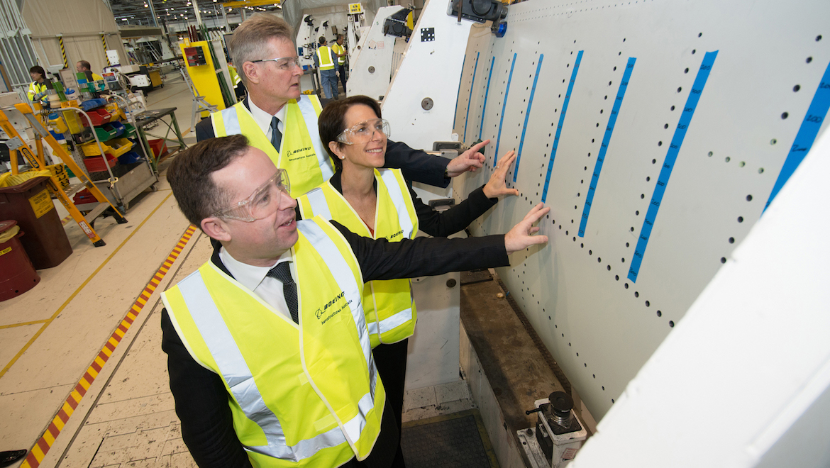 Qantas Group chief executive Alan Joyce, thenJetstar chief executive Jane Hrdlicka and former BAA chief John Duddy inspect a trailing edge bound for Jetstar’s first 787. (Jetstar)