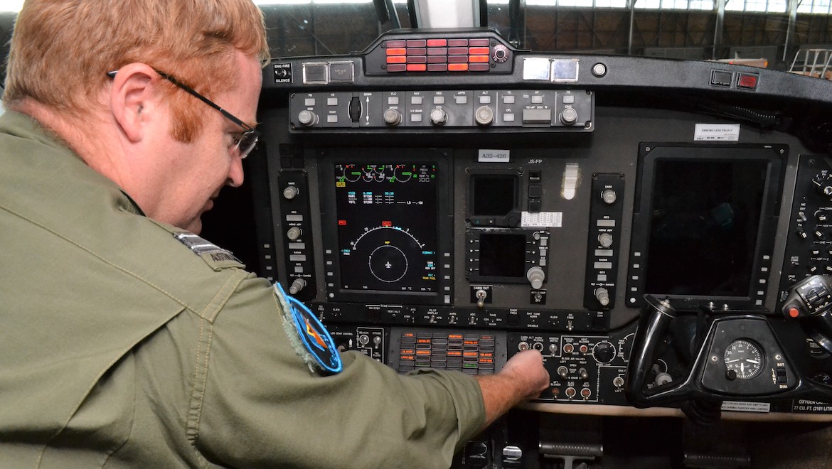 38SQN’s FLTLT Stephen Maunder demonstrates the King Air’s systems. (Michael Serenc)