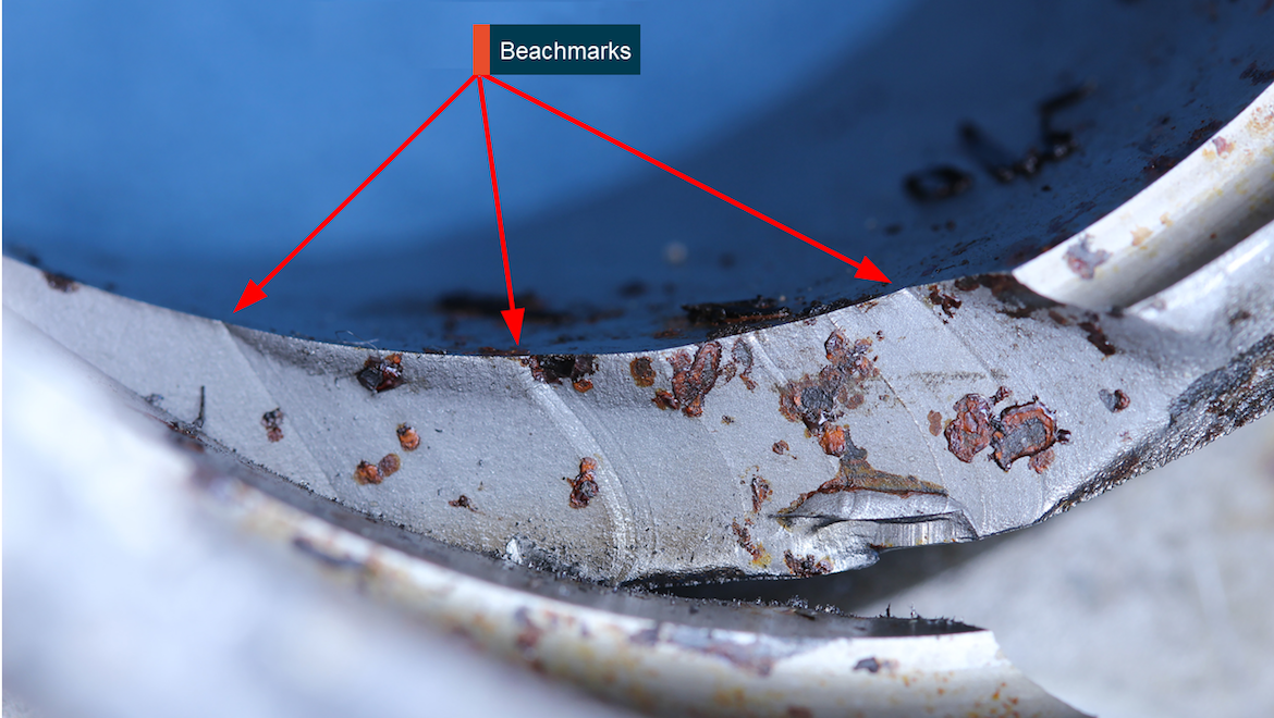 Section of the exposed propeller shaft showing beachmarks. (ATSB)