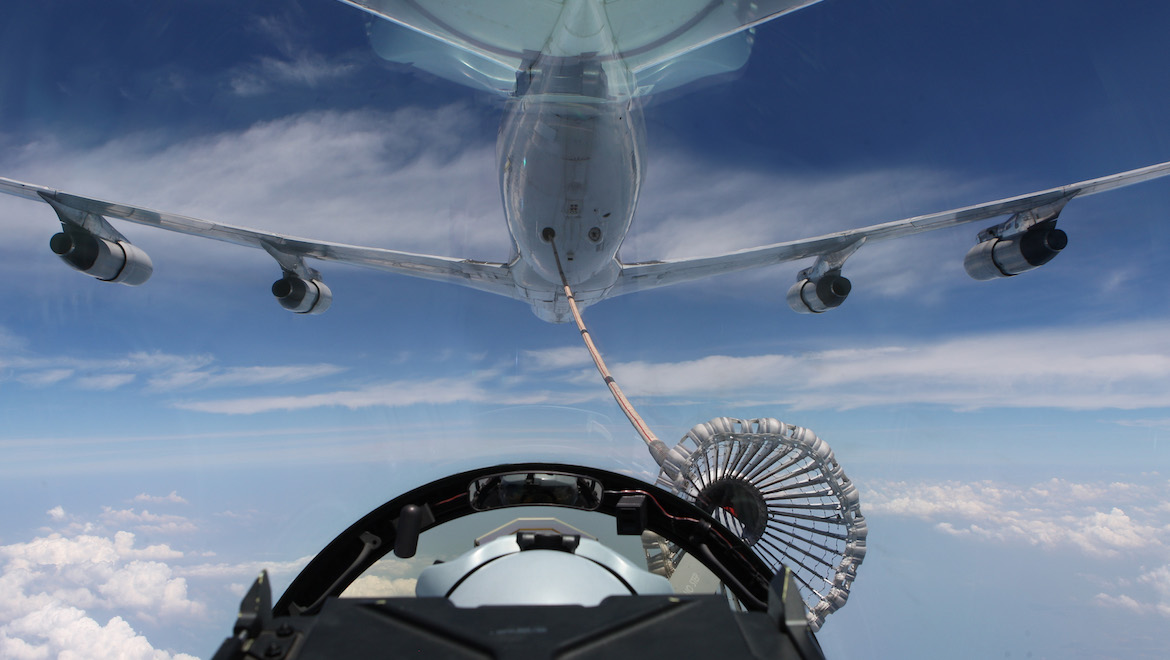 An F/A-18F Super Hornet refuels with the Omega tanker during Exercise Bersama Shield 2011. (Defence)