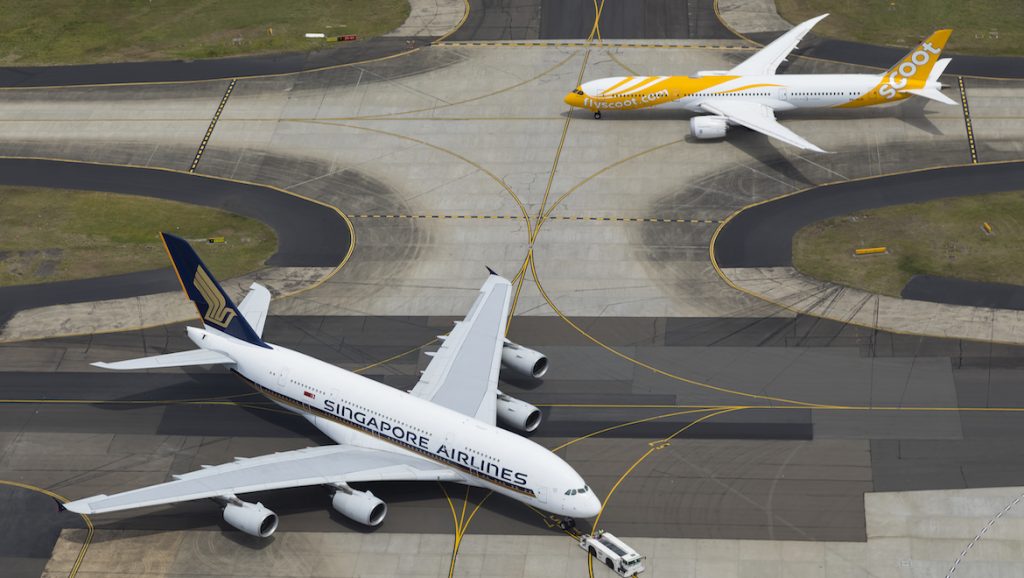 A Singapore Airlines Airbus A380 at Sydney Airport alongside a Scoot 787. (Seth Jaworski)