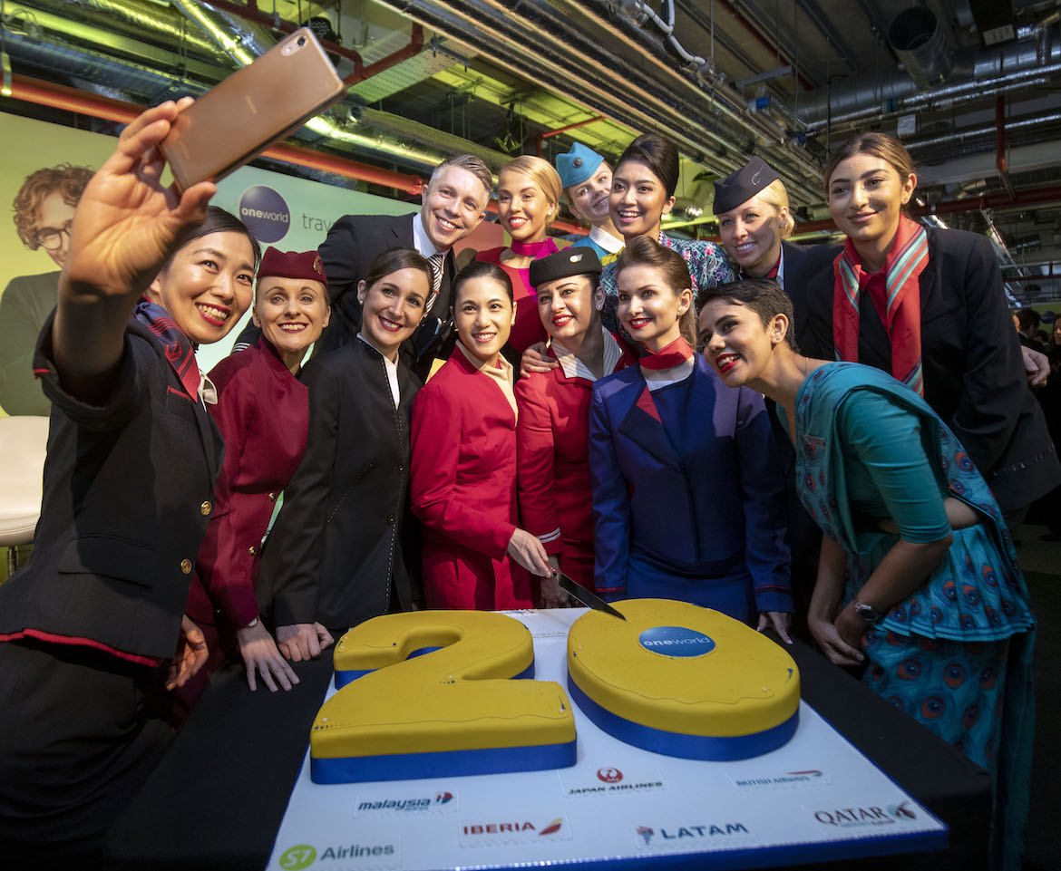 Cabin crew from oneworld member airlines celebrate the alliance's 20th birthday. (oneworld)