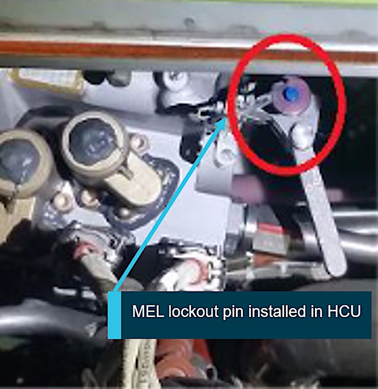 The MEL lockout pin installed in thrust reverser hydraulic control unit (HCU). (ATSB)