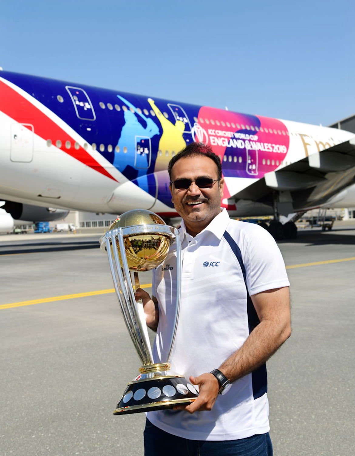 Indian cricketer Virender Sehwag with the International Cricket Council World Cup trophy. (Emirates)
