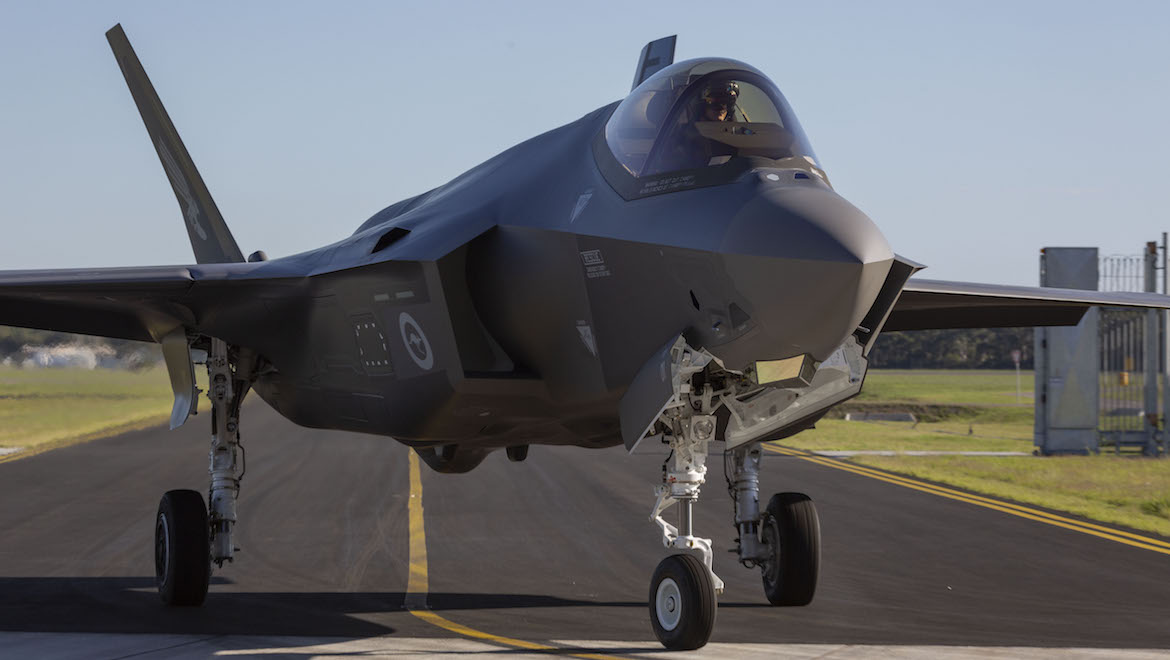 RAAF F-35A Joint Strike Fighter A35-011 taxis into the hangars at RAAF Base Williamtown. (Defence)