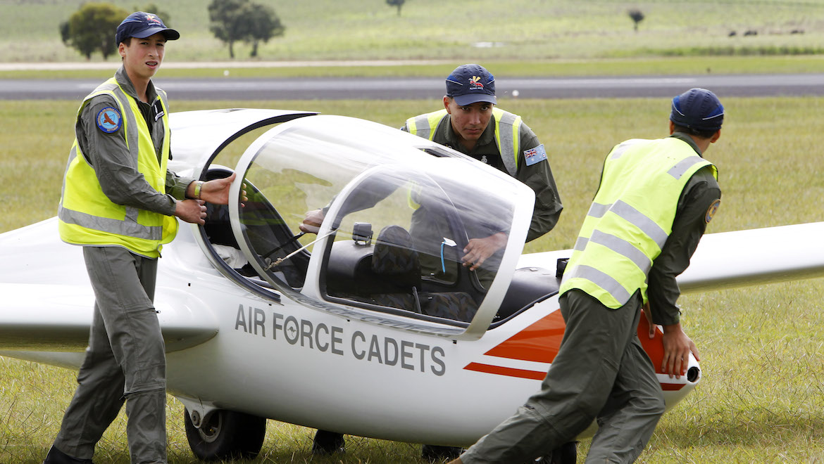 Teamwork is a key component of gliding in the AAFC, with a team of cadets helping to get the aircraft ready for takeoff. (Defence)