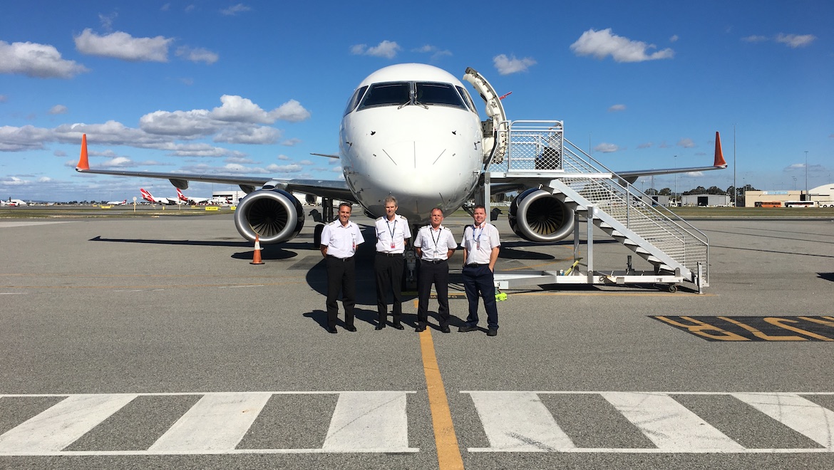 Captain Wayne Ovens, Captain Rob Carratello, Captain John Krepp and Engineer Luke Pedder in front of the Embraer E190 which arrived in Perth on 17 March 2019. (Cobham Aviation Services)