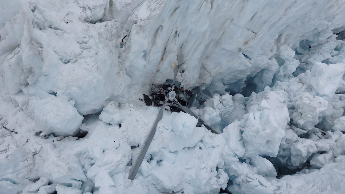 The crashed helicopter in the Fox Glacier crevasse. (New Zealand Police/TAIC)