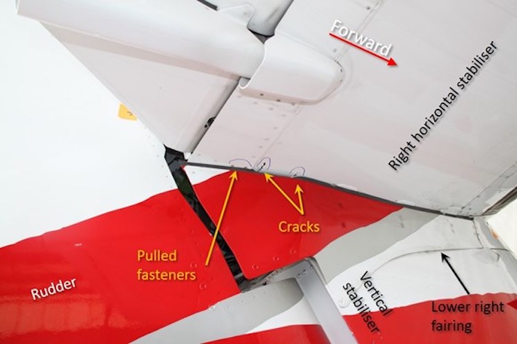 Damage visible on the lower right side of the horizontal stabiliser included fasteners pulled through the lower skin and cracks in the lower skin panel. (ATSB)