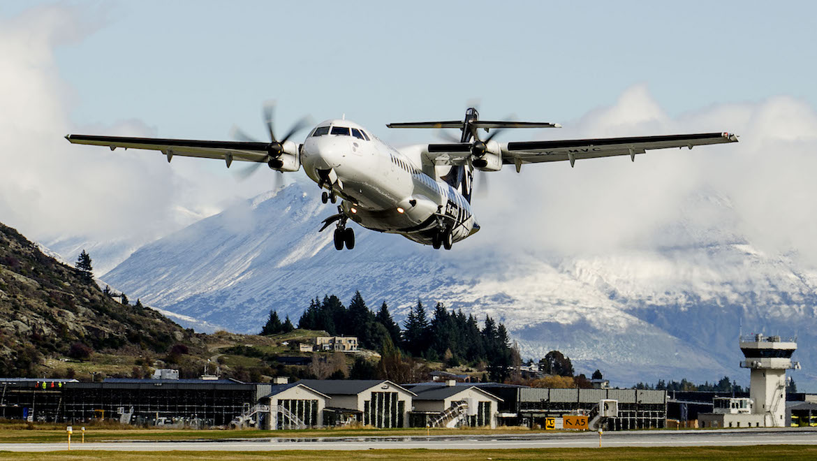 An aircraft takes off from Queenstown Airport.
