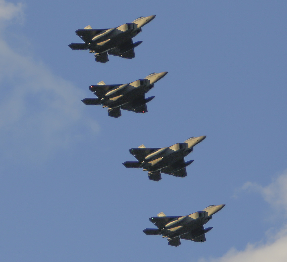 USAF F-22 Raptors flying in formation over RAAF Base Amberley for Exercise Talisman Sabre 2019. (Defence)