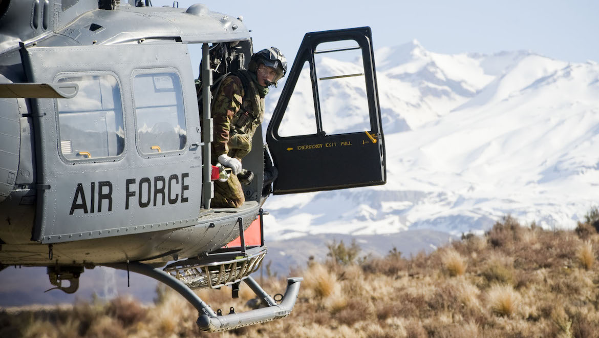 A 3 Squadron Iroquois supporting Taupo Land Search and Rescue with winch training and personnel movement during an exercise in the Kaimanwa Forest Park. (NZ Defence Force)