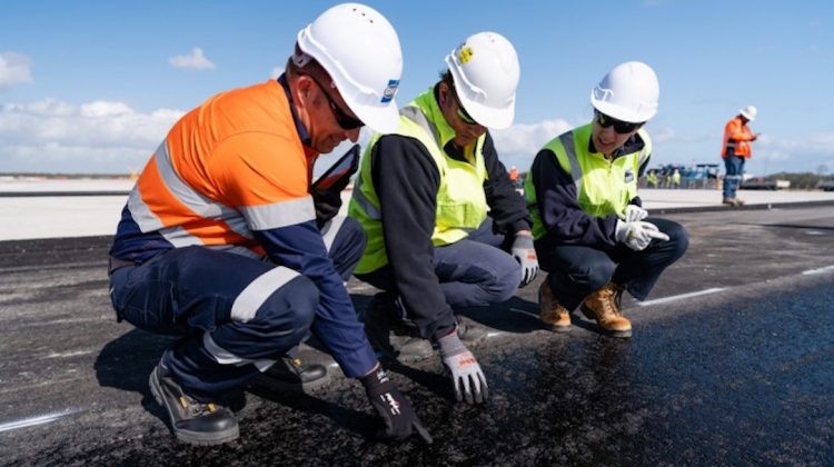 Brisbane Airport's third runway has reached the stage where asphalt is being laid down. (Brisbane Airport/Jen Dainer)