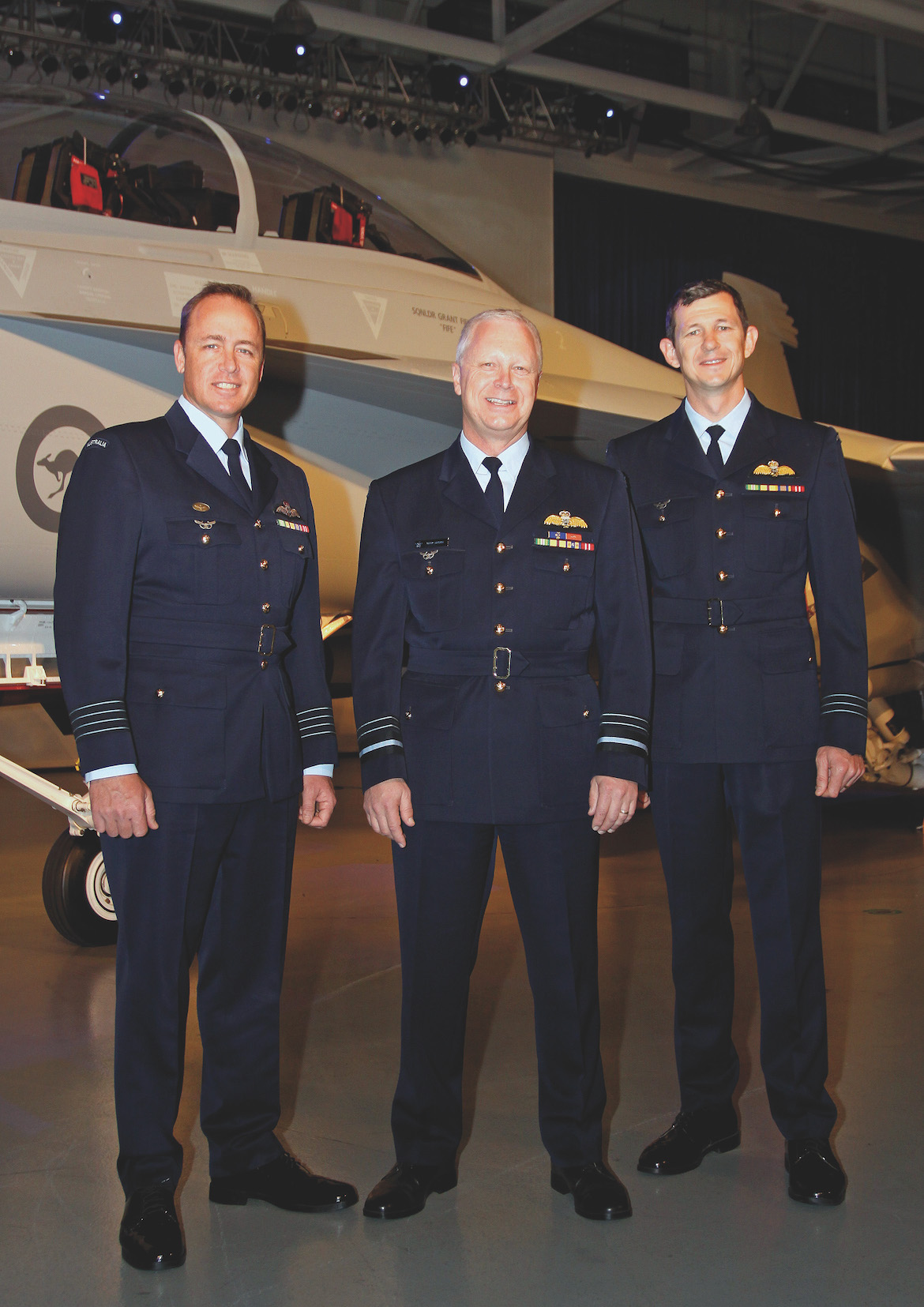 Air Combat Transition Office head GPCAPT Steve Roberton, Chief of Air Force, AIRMSHL Mark Binskin, and 1SQN commanding officer, WGCDR Glen Braz with A44-201. (Andrew McLaughlin)