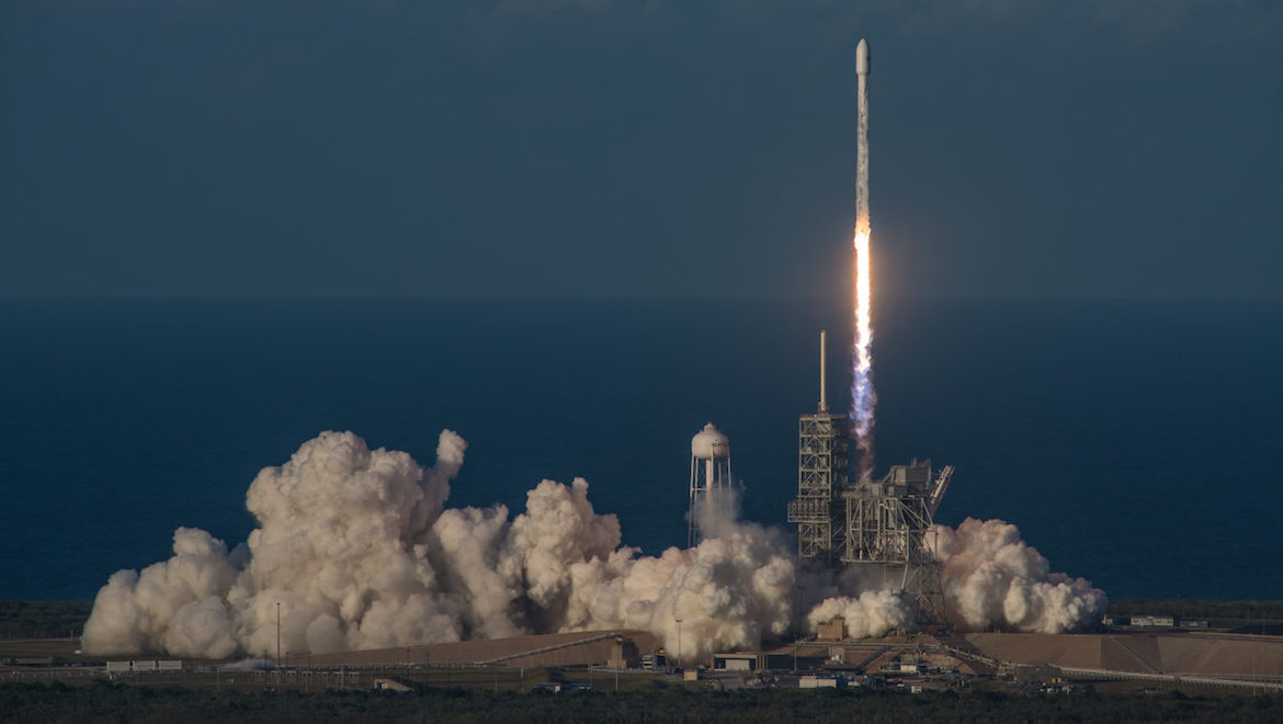An Inmarsat 5 F4 global express satellite atop a SpaceX rocket. (SpaceX)