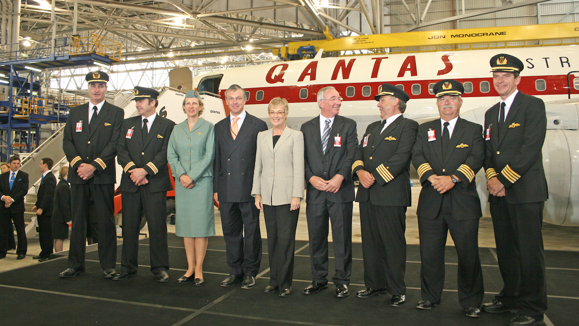 Flight engineers Joe Plemenuk and Harry Hermans, flight attendant Karen Glass, Senator Ian Campbell, Margaret Jackson, Warwick Tainton from the Qantas Founders Museum and Captains Murray Warfield, Roger Walter, and Brett Phoebe at the 707’s official welcome ceremony in a Qantas Jetbase hangar in Sydney. (Andrew McLaughlin)