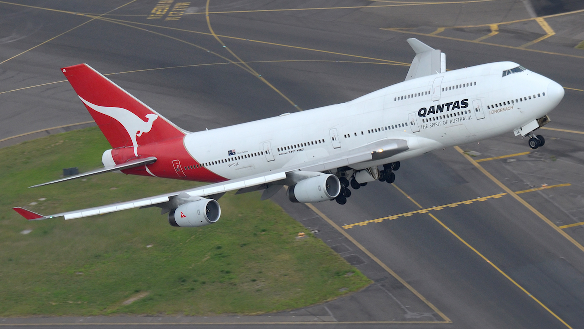 A file image of Qantas Boeing 747-400 VH-OJA flying over Sydney Airport. (Damien Aiello)