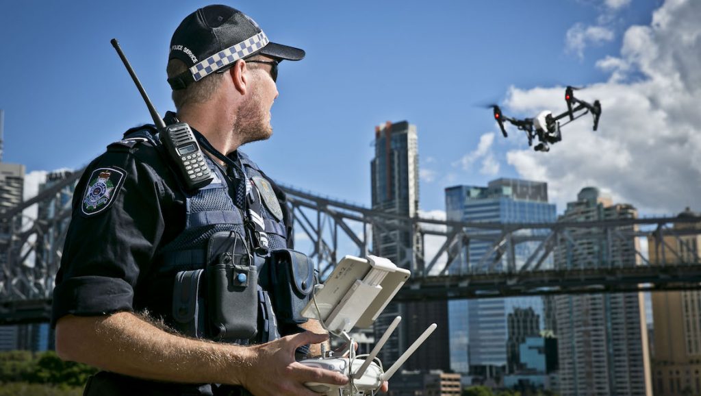 Sergeant Rob Whittle operates a drone in Brisbane. (Queensland Police)