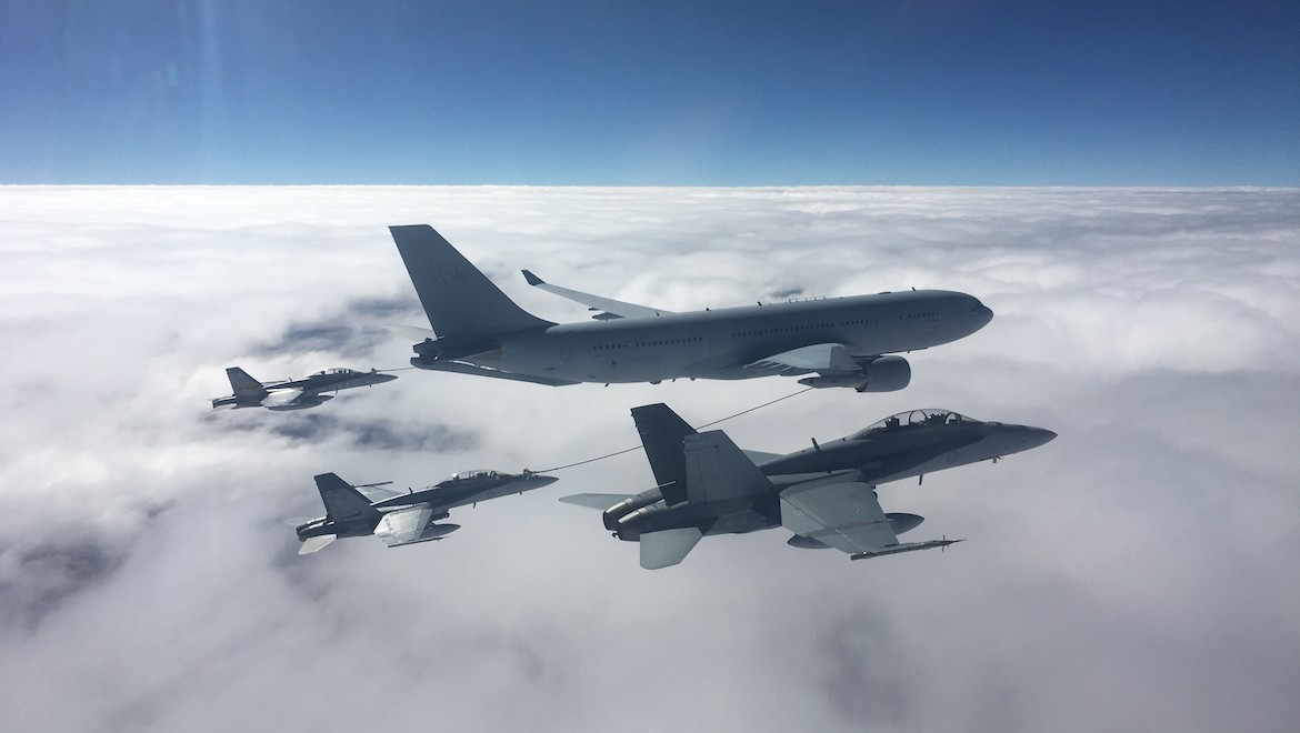 RAAF F/A-18 Hornets take on additional resources from a KC-30A MRTT as part of the AWI course. (Defence)