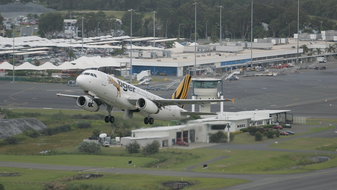 Tiger Airbus A320 VH‑VNB departs from the Gold Coast Airport bound for Melbourne. (Paul Sadler)
