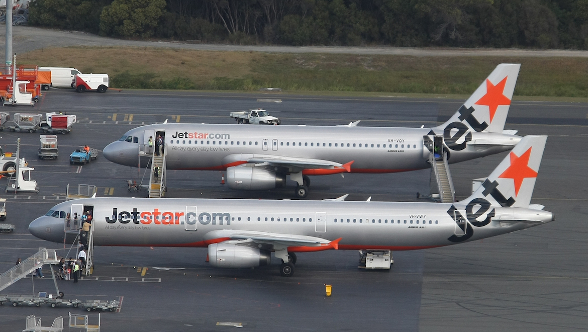 A Jetstar Airbus A321 and A320 side by side at Gold Coast Airport. (Paul Sadler)