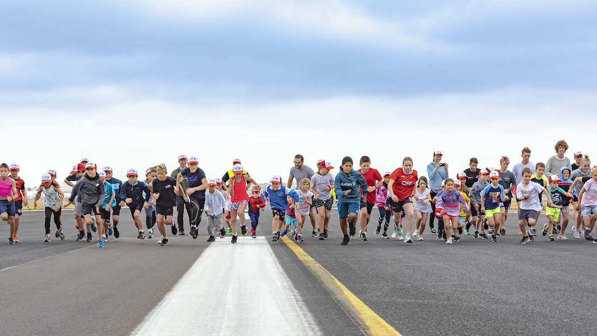 Participants at the 2019 runway run. (Kurt Ams)