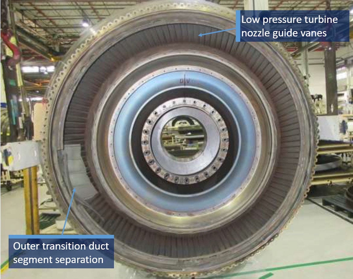 Front view of low pressure turbine section showing the outer transition duct segment separation and movement into the low pressure turbine airflow path. (ATSB/Pratt & Whitney)