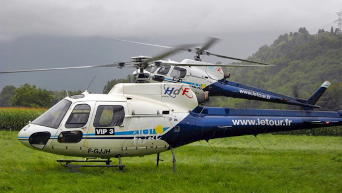 Two of the five VIP helicopters during the Grenoble time trial stage. (Thierry Moïse)