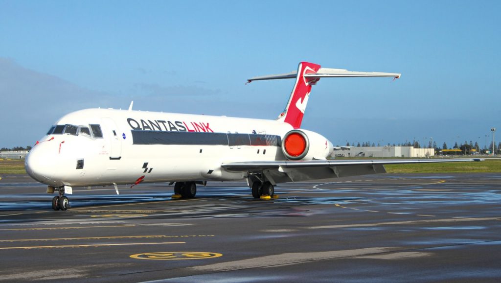 A freshly painted VH-YQT parked up at Adelaide Airport in her new decals.