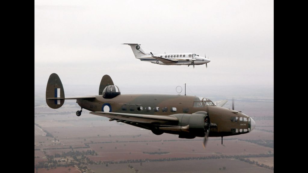 A 32SQN King Air, showing off its 70th anniversary tail whilst flying with the Hudson from Temora museum.