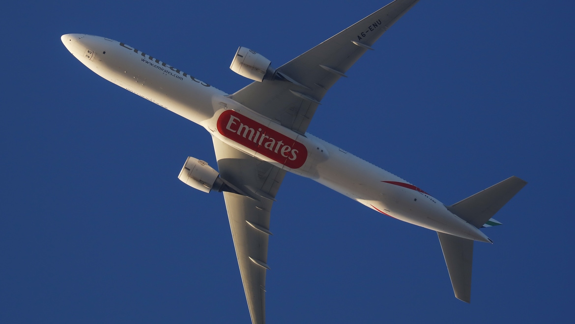 An Emirates 777-31H(ER), A6-ENU, as shot by Victor Pody